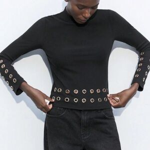 Black along sleeve with embellishments